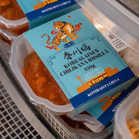 Golden Unicorn Korean-style chili chicken meal in blue packaging.